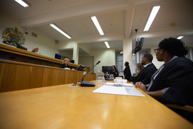 people sitting in a courtroom