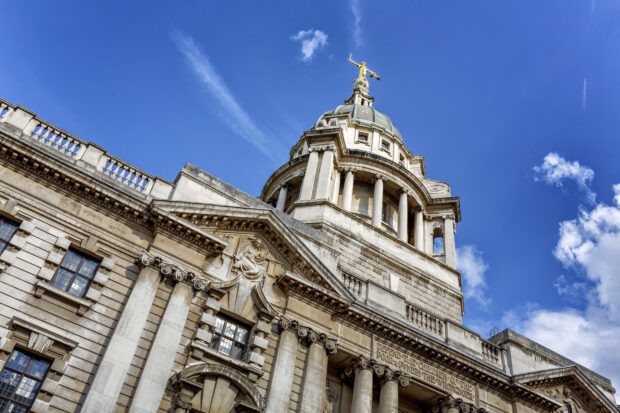 The Statue of Justice on the Old Bailey in London .