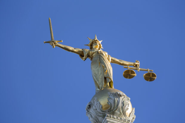 View of Lady Justice on top of Old Bailey the Central Criminal Court of England and Wales.