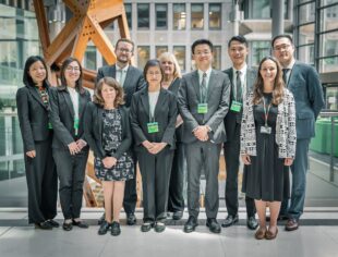 HMCTS staff and representatives of the Taiwanese judiciary pose for a photo together. 